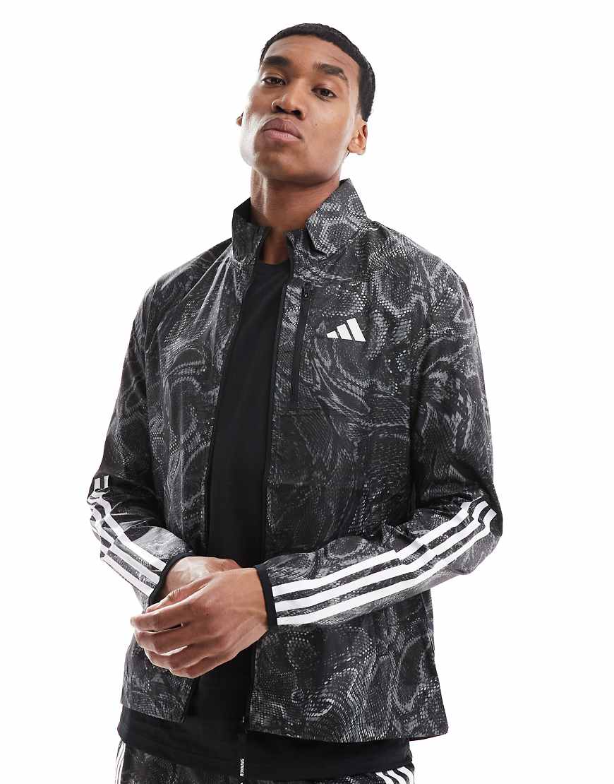 adidas Running - Own The Run - Laufjacke in Schwarz mit durchgängigem Print von adidas performance