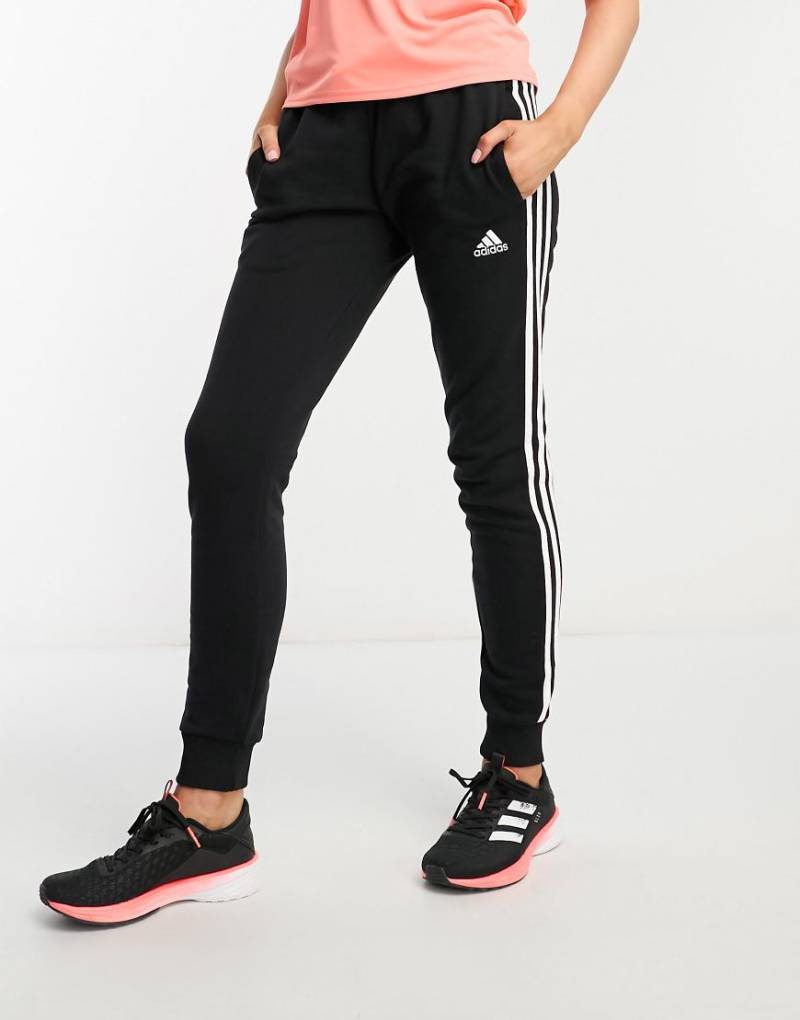 adidas Sportswear - Essentials - Jogginghose in Schwarz mit den 3 Streifen in Weiß von adidas performance