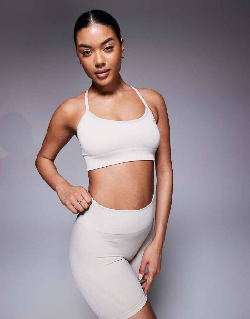 adidas Training - Sport-BH aus Strickstoff in Stone mit leichter Stützfunktion-Weiß von adidas performance