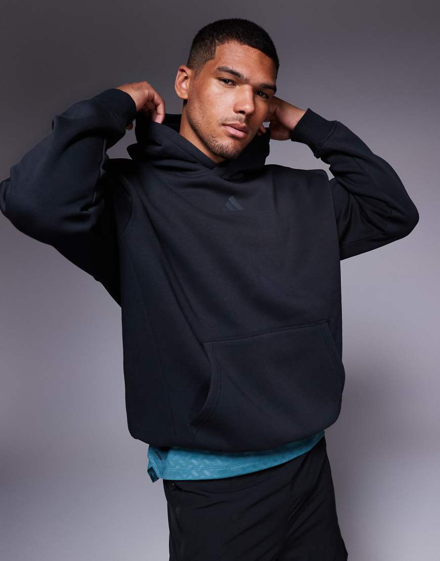 adidas Training - Strength - Oversize-Kapuzenpullover in Schwarz von adidas performance