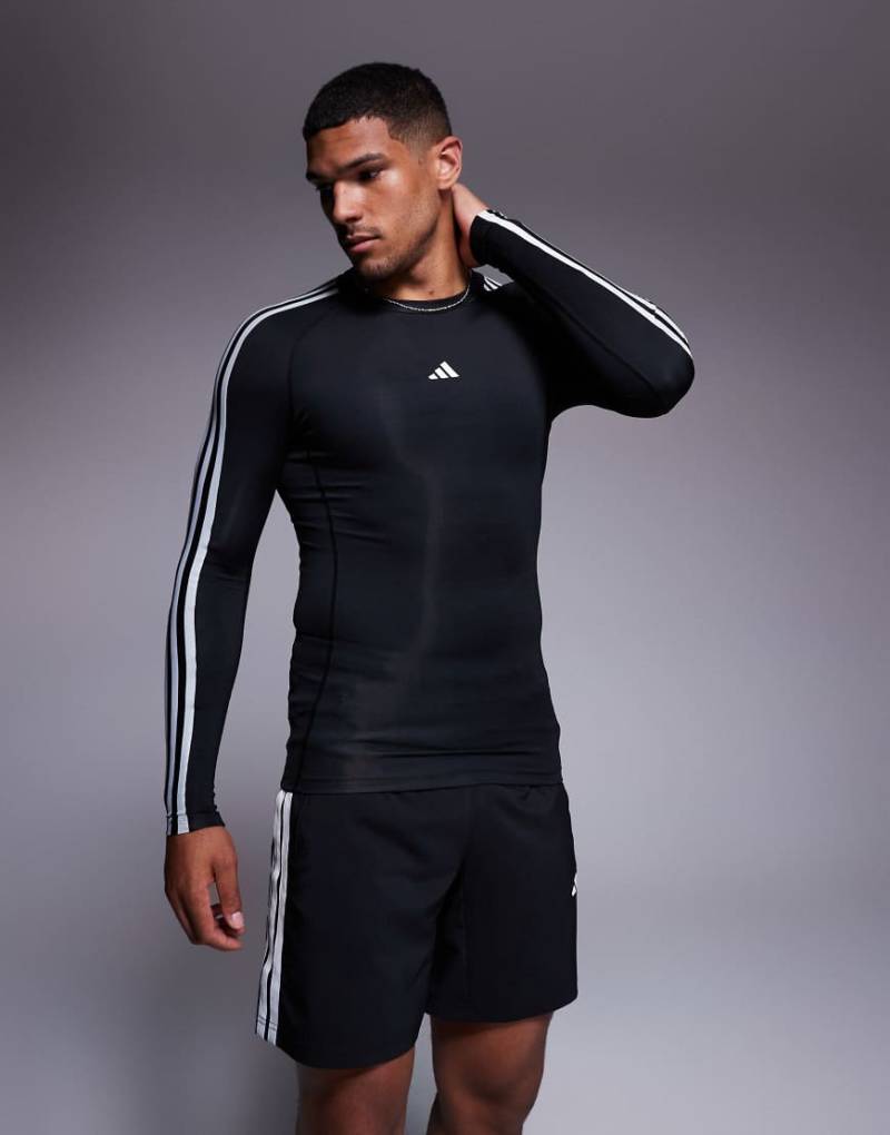 adidas Training - Tech Fit - Langärmliges Oberteil in Schwarz mit den 3 Streifen adidas Training - Tech Fit - Langärmliges Oberteil in Schwarz mit den 3 Streifen von adidas performance
