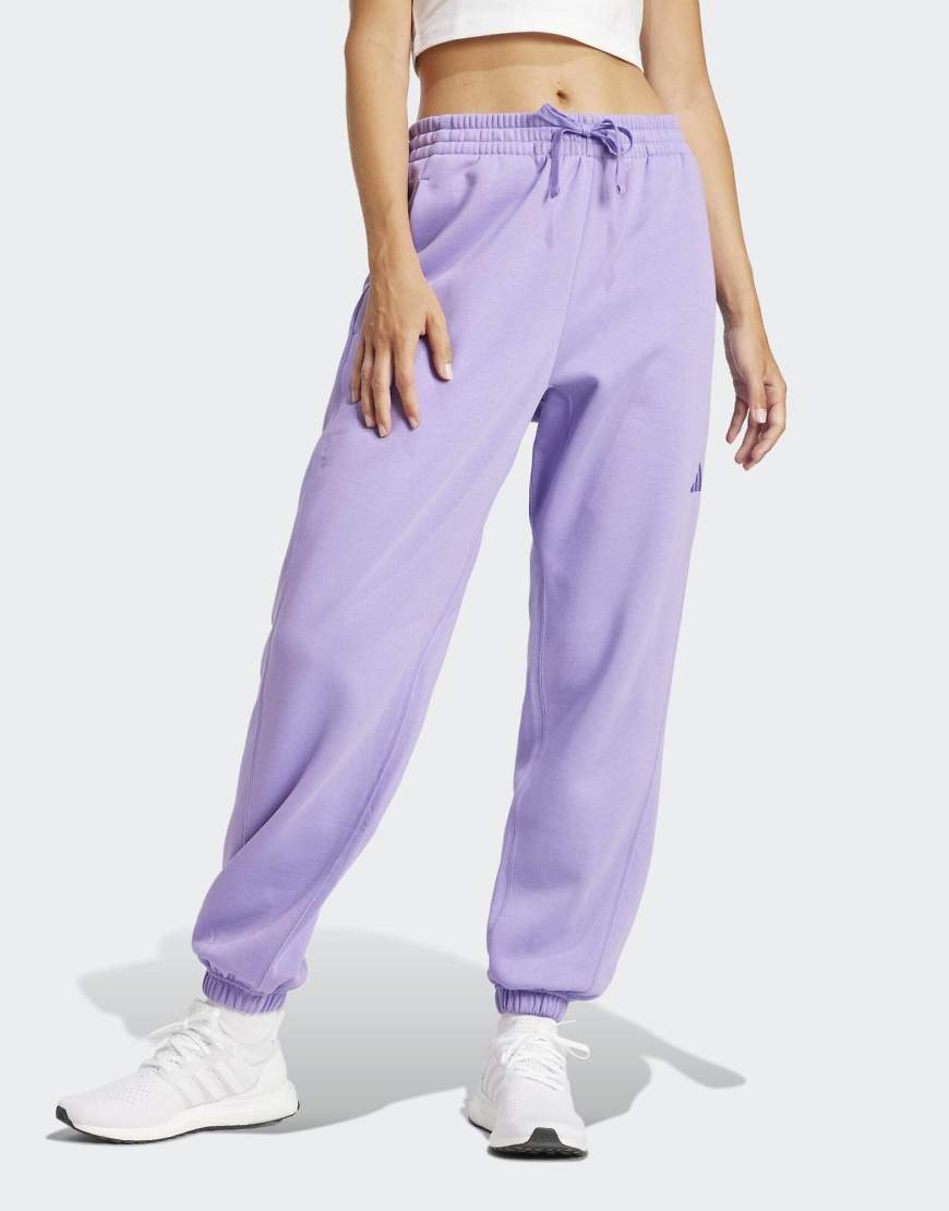 adidas performance - Essentials - Hose aus French Terry in Schwarz / Weiß mit den drei Streifen und Bündchen von adidas performance