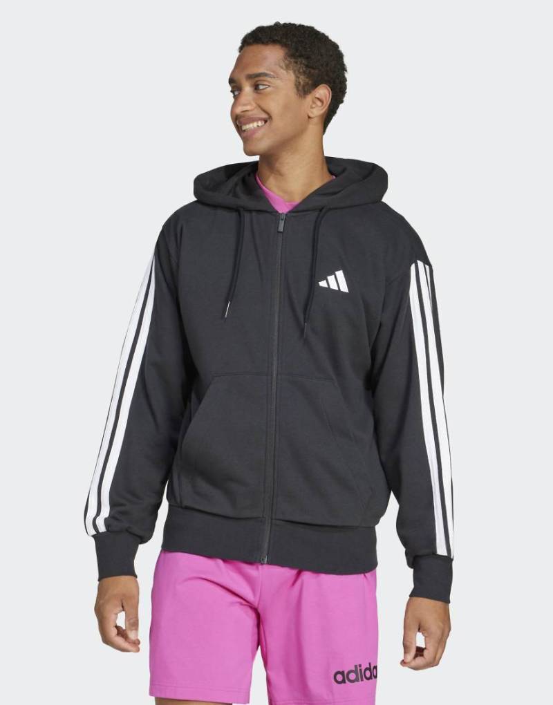 adidas performance - Essentials - Kapuzenjacke aus French Terry in Schwarz / Weiß mit den drei Streifen von adidas performance