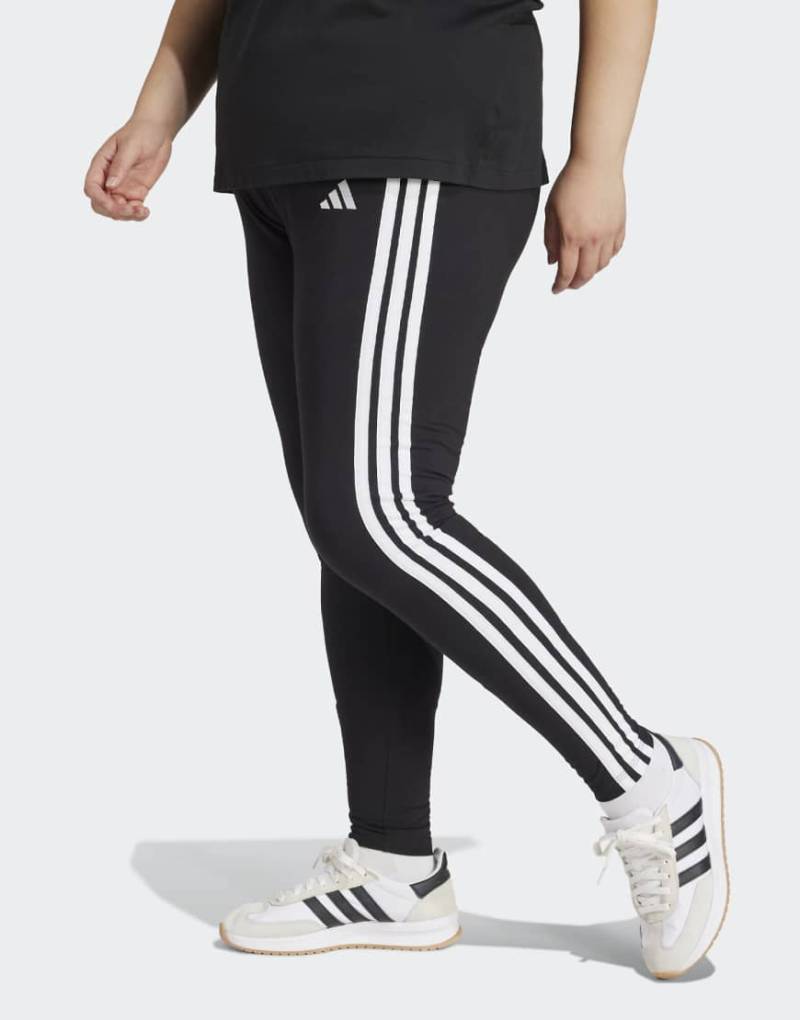 adidas performance - Essentials - Plus-Size-Leggings aus Baumwolle in Schwarz / Weiß mit den drei Streifen von adidas performance