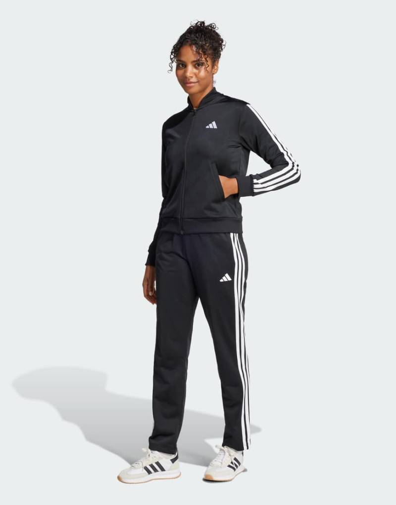 adidas performance - Essentials - Trainingsanzug in Schwarz mit den drei Streifen von adidas performance