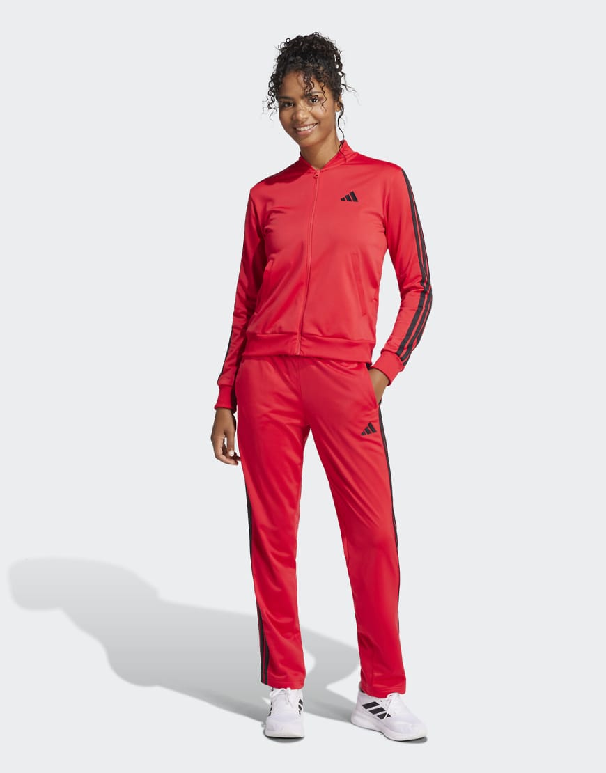 adidas performance - Essentials - Trainingsanzug in reinem Rubinrot mit den drei Streifen von adidas performance