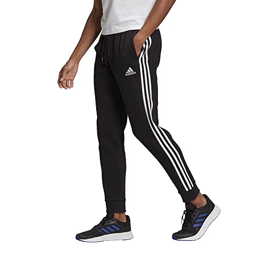 adidas Essentials Herrenhose aus Fleece, mit konischem Bündchen und 3-Streifen, Schwarz/Weiß, Groß von adidas
