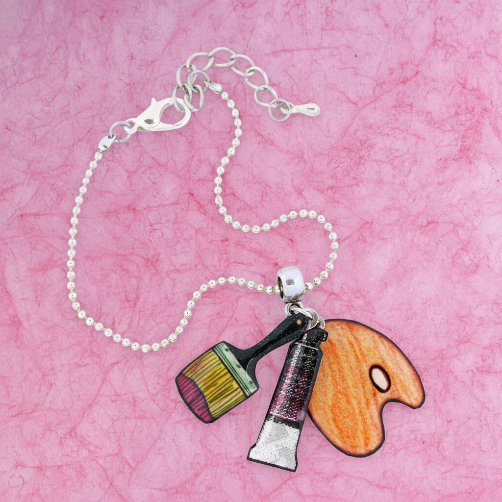 Kettenarmband Mit Pinsel Und Farbtuben von bijouxlafeecameleon