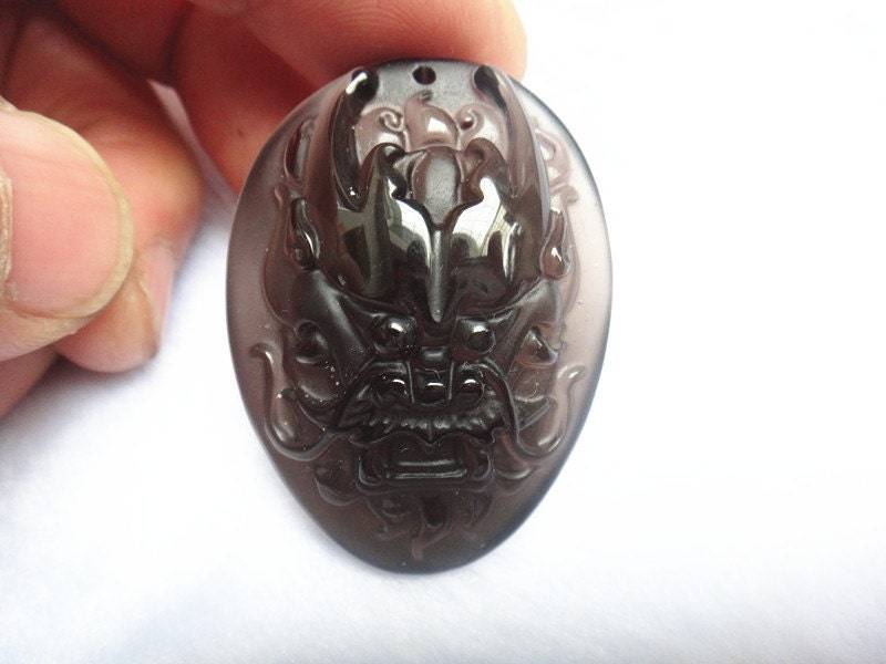 Natürliche Eis Arten Von Obsidian Drachen Kopf Anhänger Natürliche Eis Arten Von Obsidian Drachen Kopf Anhänger von blackbeaded