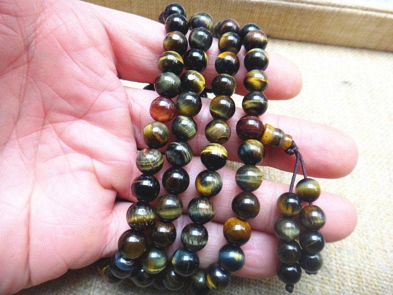 Natürliches Tigerauge Perlen Armband 108 Gebetsperlen Natürliches Tigerauge Perlen Armband 108 Gebetsperlen von blackbeaded