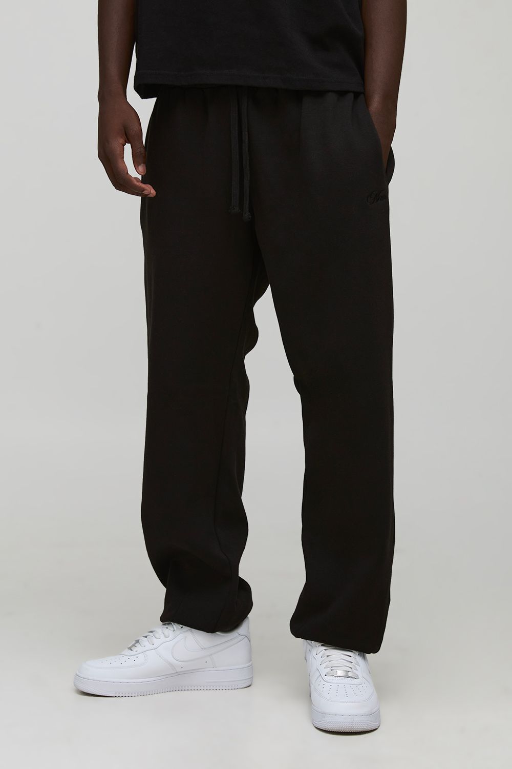 Oversized Man Script Embroidered Cuffed Joggers - Black - S, Black von boohoo