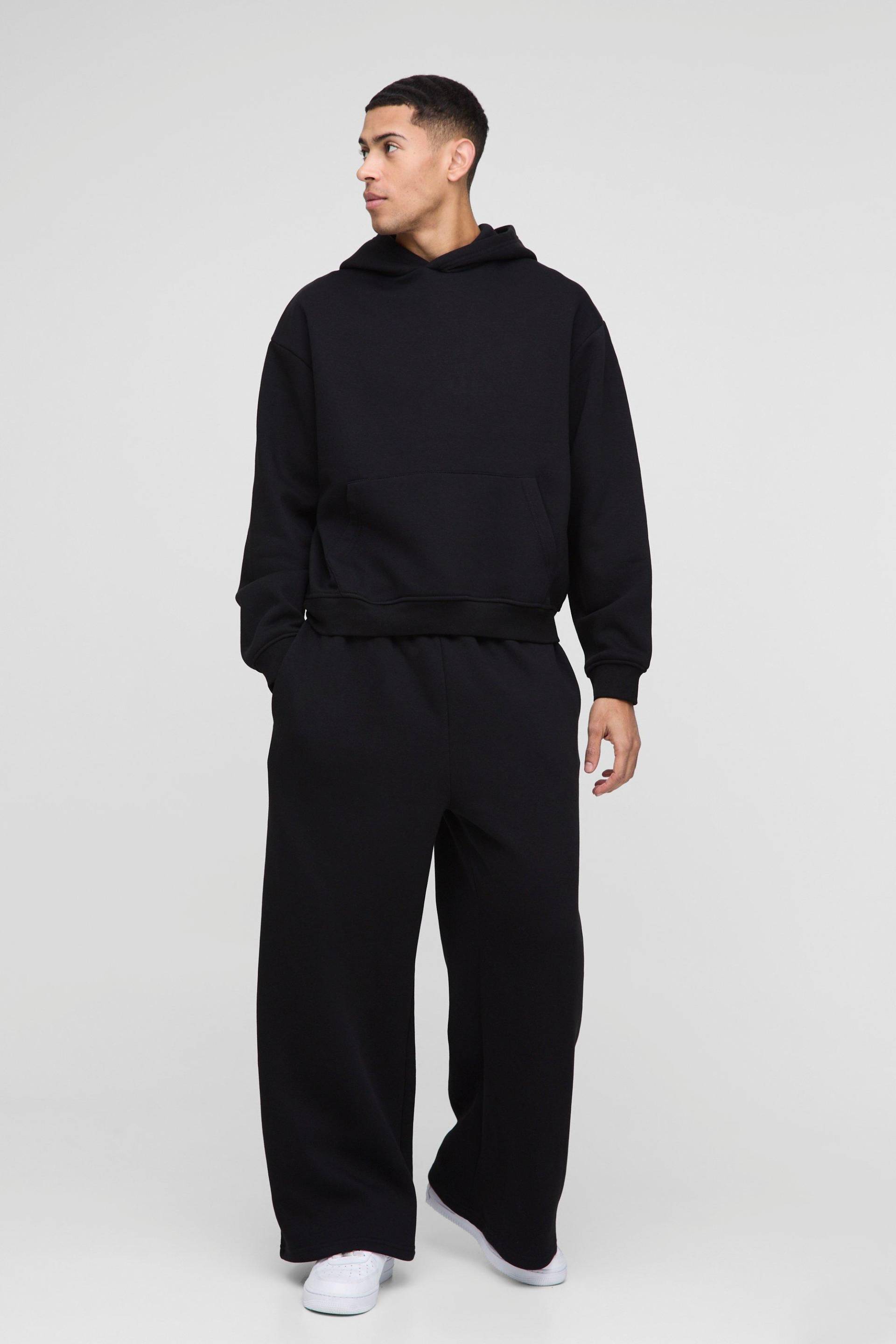 Kastiger Oversize Trainingsanzug mit Kapuze - Schwarz - L, Schwarz von boohooman