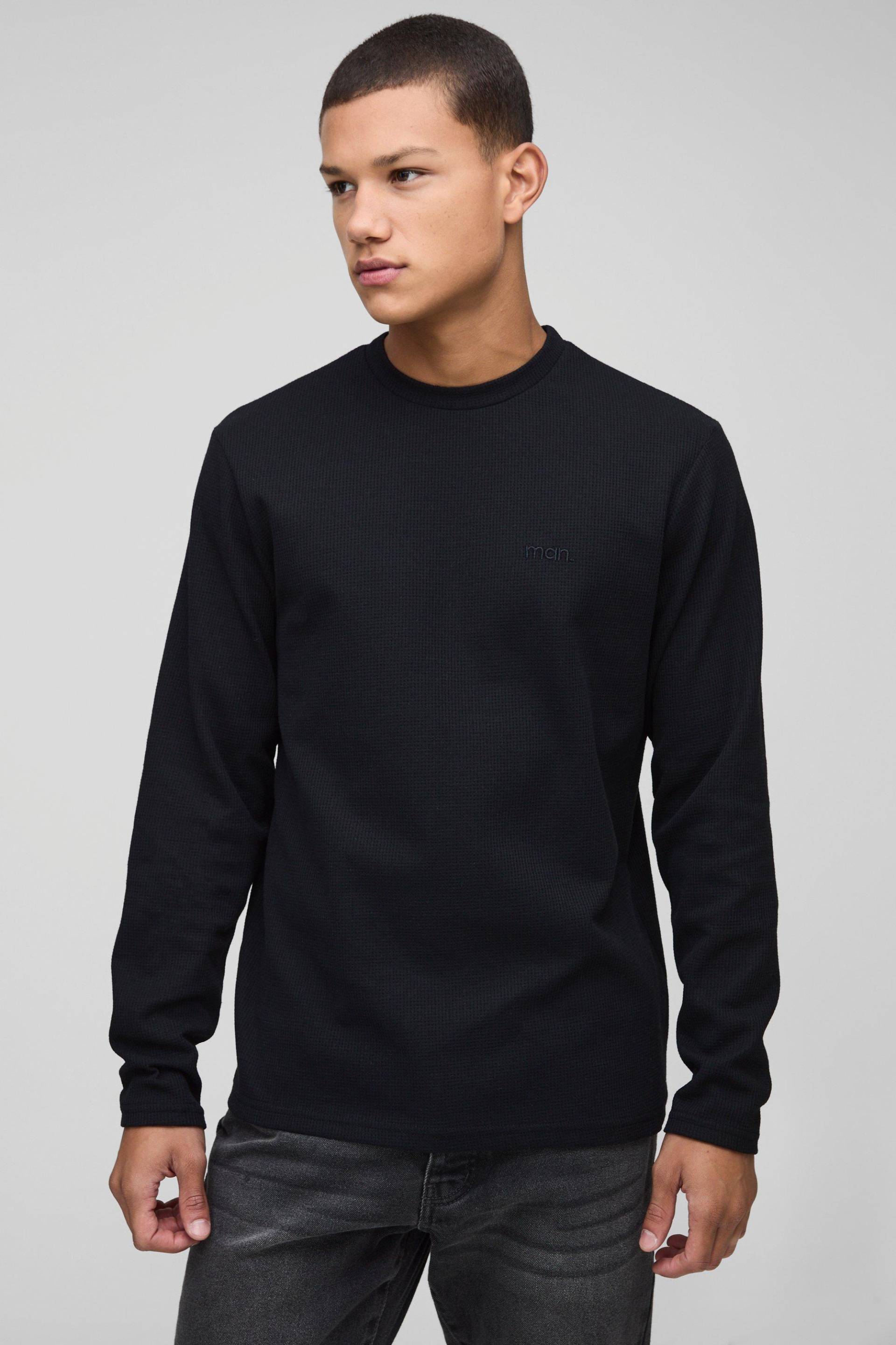 Langärmliges T-Shirt in Waffeloptik mit Man-Stickerei - Schwarz - M, Schwarz von boohooman