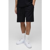 Lockere Shorts in Waffeloptik mit Man-Stickerei - Schwarz - XS, Schwarz von boohooman