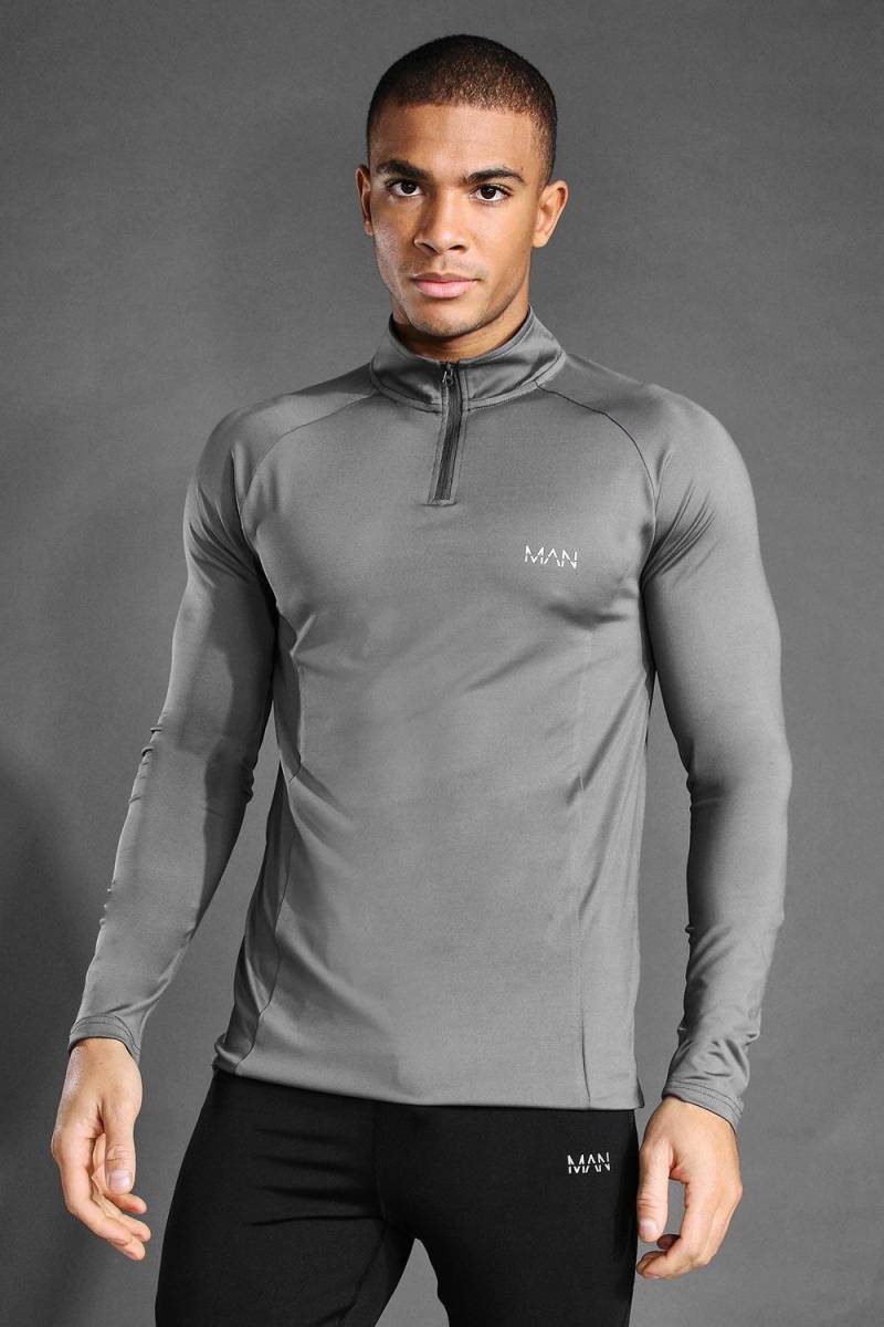Man Active Raglan Muscle-Fit Trainingsoberteil mit 1/4 Trichtigerkragen von boohooman