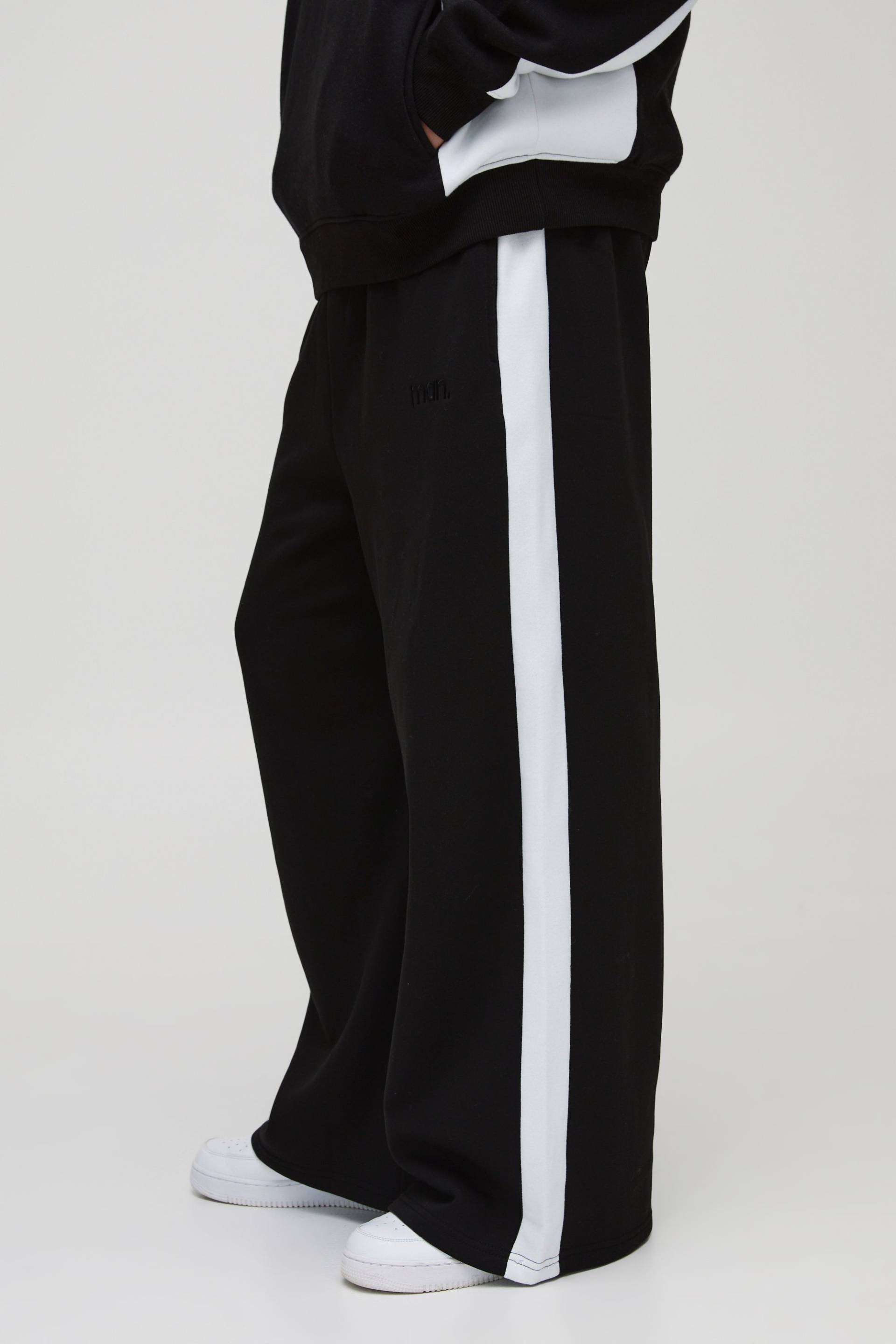 Man Colorblock Jogginghose mit extrem weitem Bein - Schwarz - L, Schwarz von boohooman