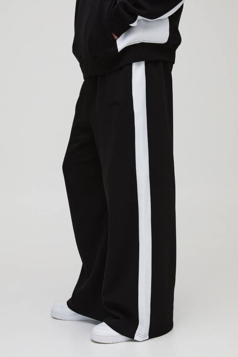 Man Colorblock Jogginghose mit extrem weitem Bein von boohooman