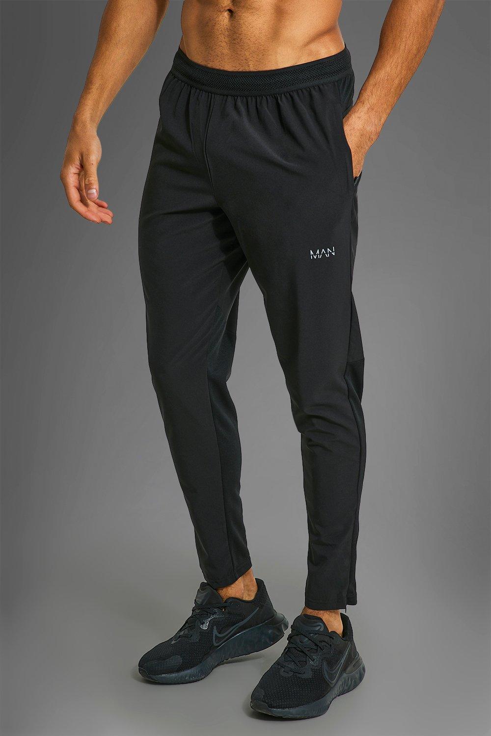 Mens Man Active Performance Jogginghose mit Reißverschluss-Taschen - black - L, black von boohooman