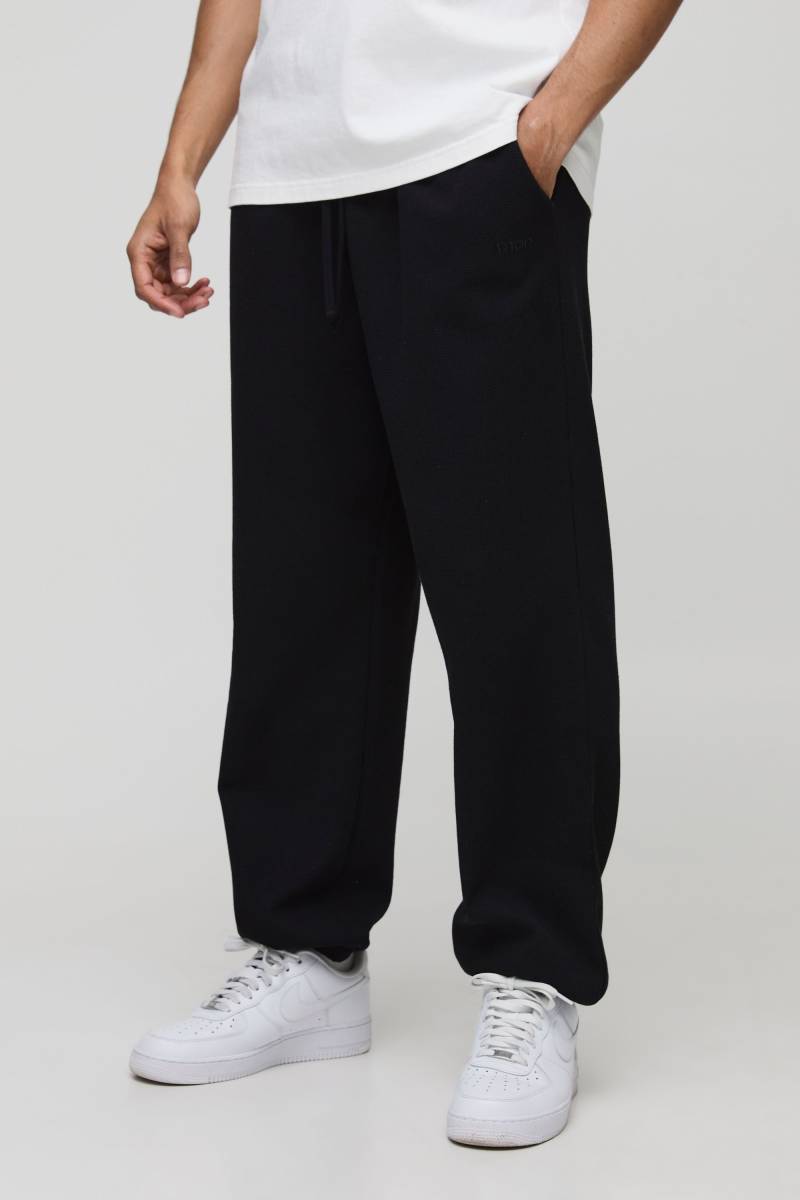 Oversize Jogginghose in Waffeloptik mit Man-Stickerei - Schwarz - XS, Schwarz Oversize Jogginghose in Waffeloptik mit Man-Stickerei - Schwarz - XS, Schwarz von boohooman