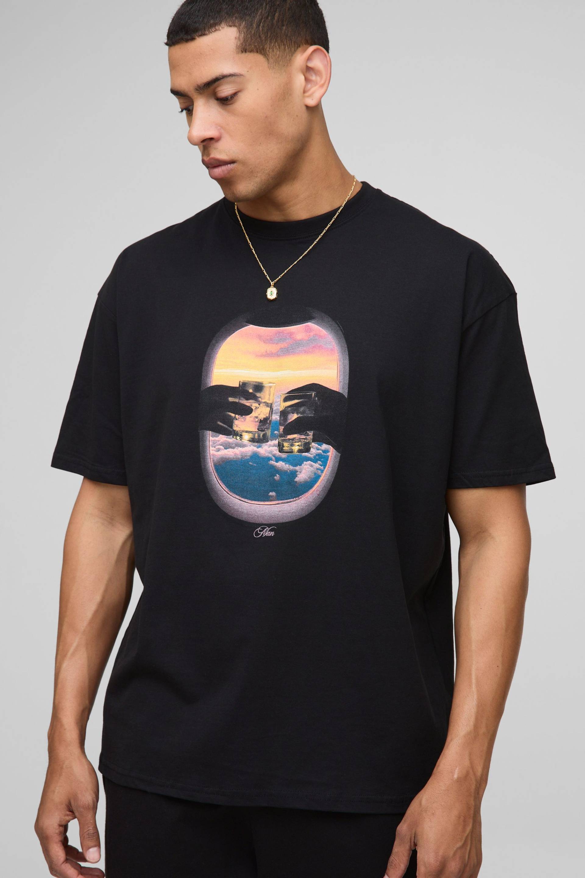 Schwarzes Oversize T-Shirt mit MAN Sunset Print von boohooman