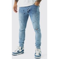 Skinny Jeans mit Rissen und Farbspritzern Skinny Jeans mit Rissen und Farbspritzern von boohooman