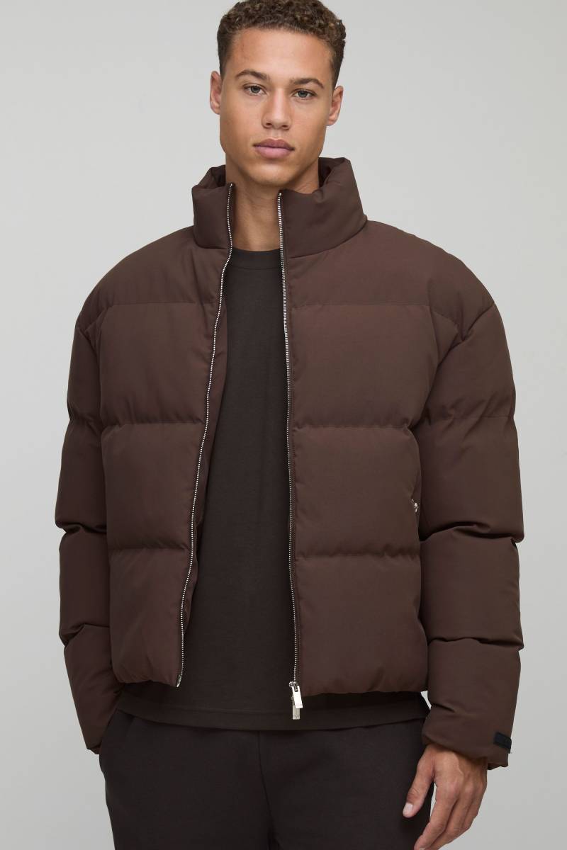 Tall kastige braune Man Steppjacke mit Trichterkragen - 2XL, Braun von boohooman