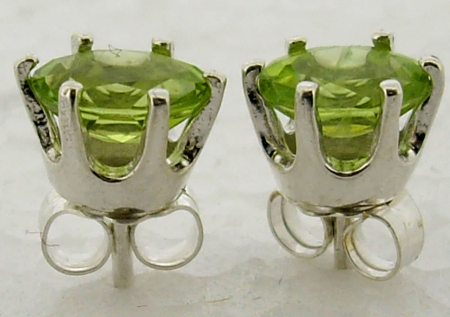 sterling Silber 5x7 Mm Oval Facettierte Peridot Ohrstecker 4442T sterling Silber 5x7 Mm Oval Facettierte Peridot Ohrstecker 4442T von butw