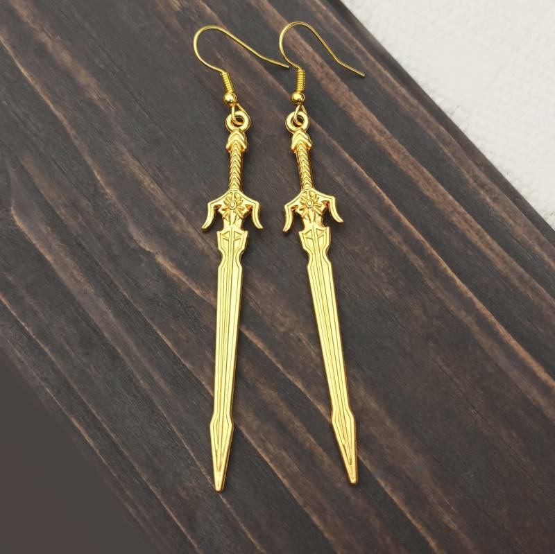 Lange Goldene Schwert Ohrringe, Fantasy Mittelalterlicher Waffen Schmuck, Klinge Dolch Witzige Baumeln Messer Creolen Oder Clip Ons, Geschenkidee Lange Goldene Schwert Ohrringe, Fantasy Mittelalterlicher Waffen Schmuck, Klinge Dolch Witzige Baumeln Messer Creolen Oder Clip Ons, Geschenkidee von bySantana