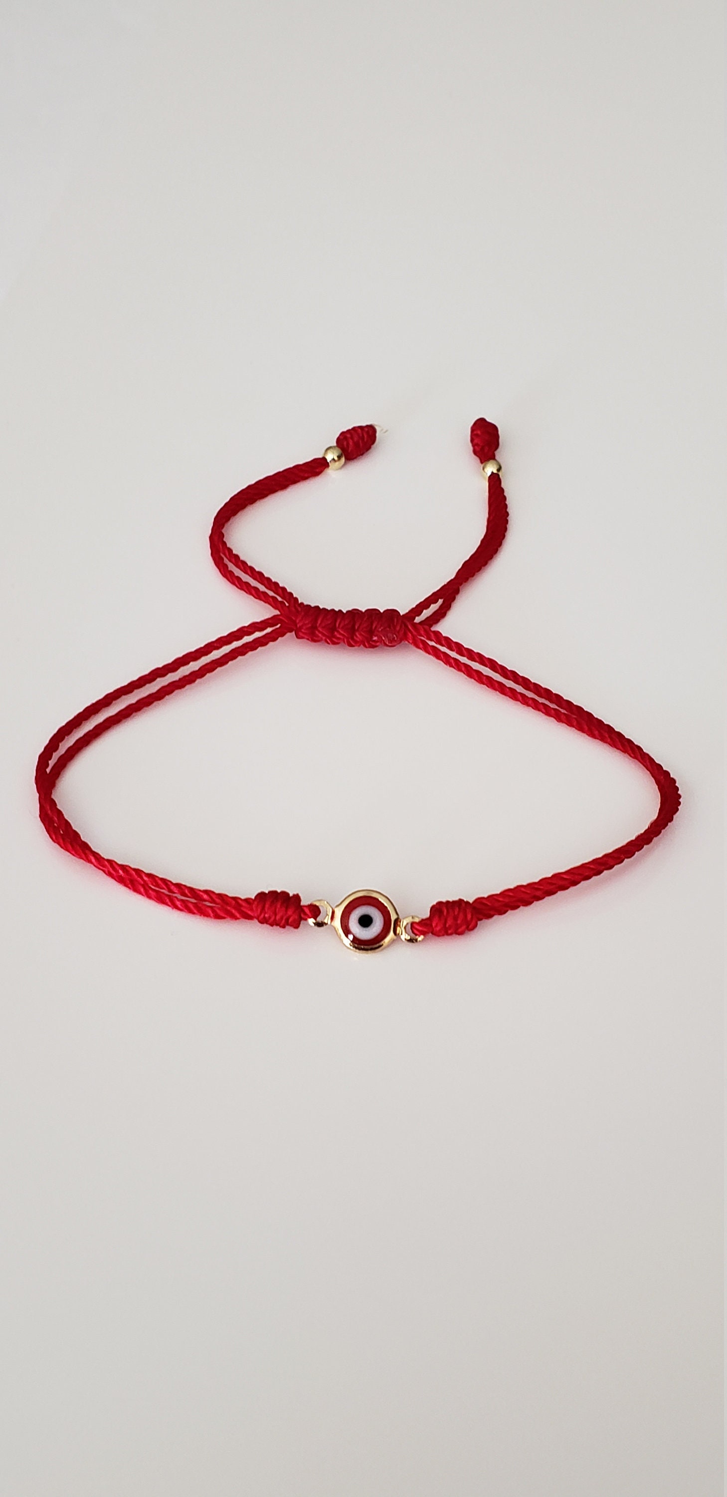 Rote Armband Mit Verstellbaren Türkisen Augen Rote Armband Mit Verstellbaren Türkisen Augen von carlartes