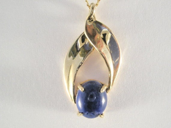 14 Karat Gold Blätter Anhänger Mit Lapis Lazuli 14 Karat Gold Blätter Anhänger Mit Lapis Lazuli von cedarislandartist