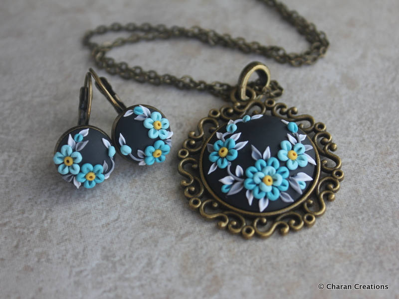 Wunderschöne Polymer Clay Applikation Statement Anhänger Halskette Und Ohrringe in Schwarz Türkis Im Set Wunderschöne Polymer Clay Applikation Statement Anhänger Halskette Und Ohrringe in Schwarz Türkis Im Set von charancreations