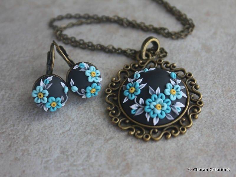 Wunderschöne Polymer Clay Applikation Statement Anhänger Halskette Und Ohrringe in Schwarz Türkis Im Set Wunderschöne Polymer Clay Applikation Statement Anhänger Halskette Und Ohrringe in Schwarz Türkis Im Set von charancreations