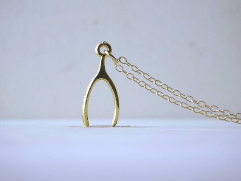 Wunschknochen-Halskette in Gold Wunschknochen-Halskette in Gold von cocobijouxco