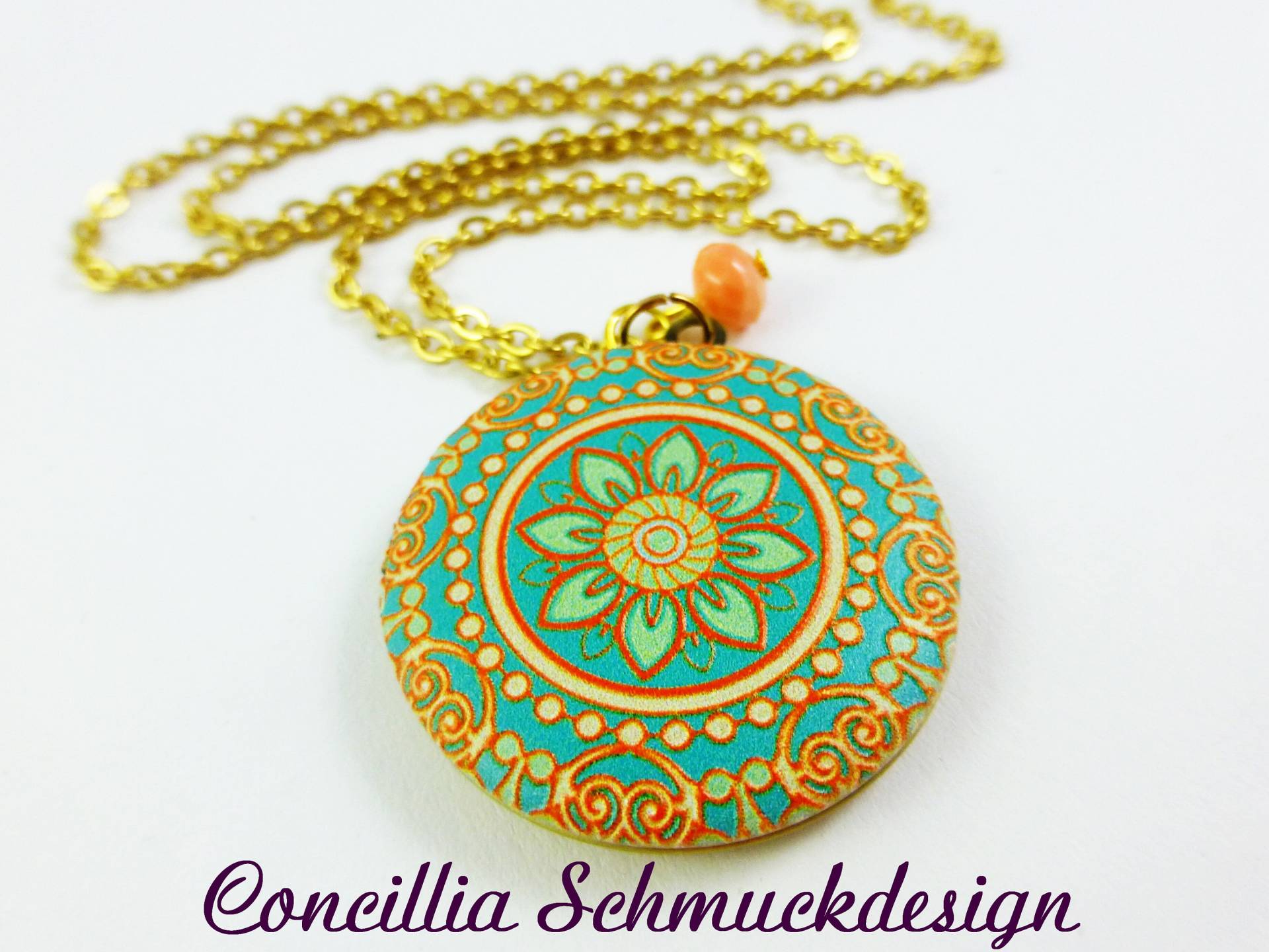 Medaillon Mandala Blume Orange Türkis von concilliadesign