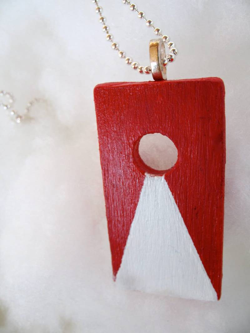 "Die "Cornhole" Halskette." von conglomertron