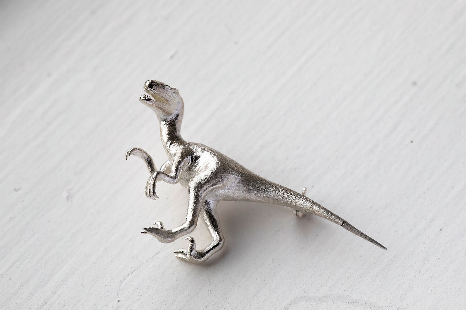 Raptor Brosche von customDinoDesigns