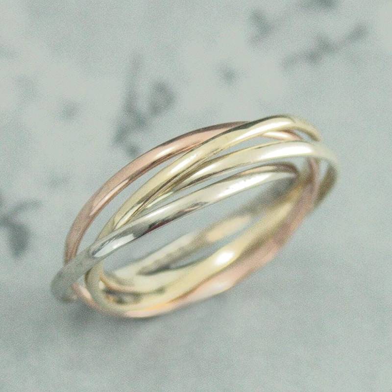 Rolling Ring Multi Color Vier Goldringe 1, 5 Mm Bands Wedding 14K Interlocking Rings Intertwined Gold von debblazer