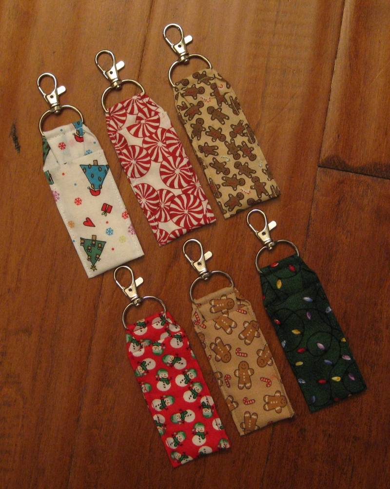 Weihnachts-stoff Lippenbalsamhalter Lebkuchenmänner, Pfefferminzbonbons von doodleheadz