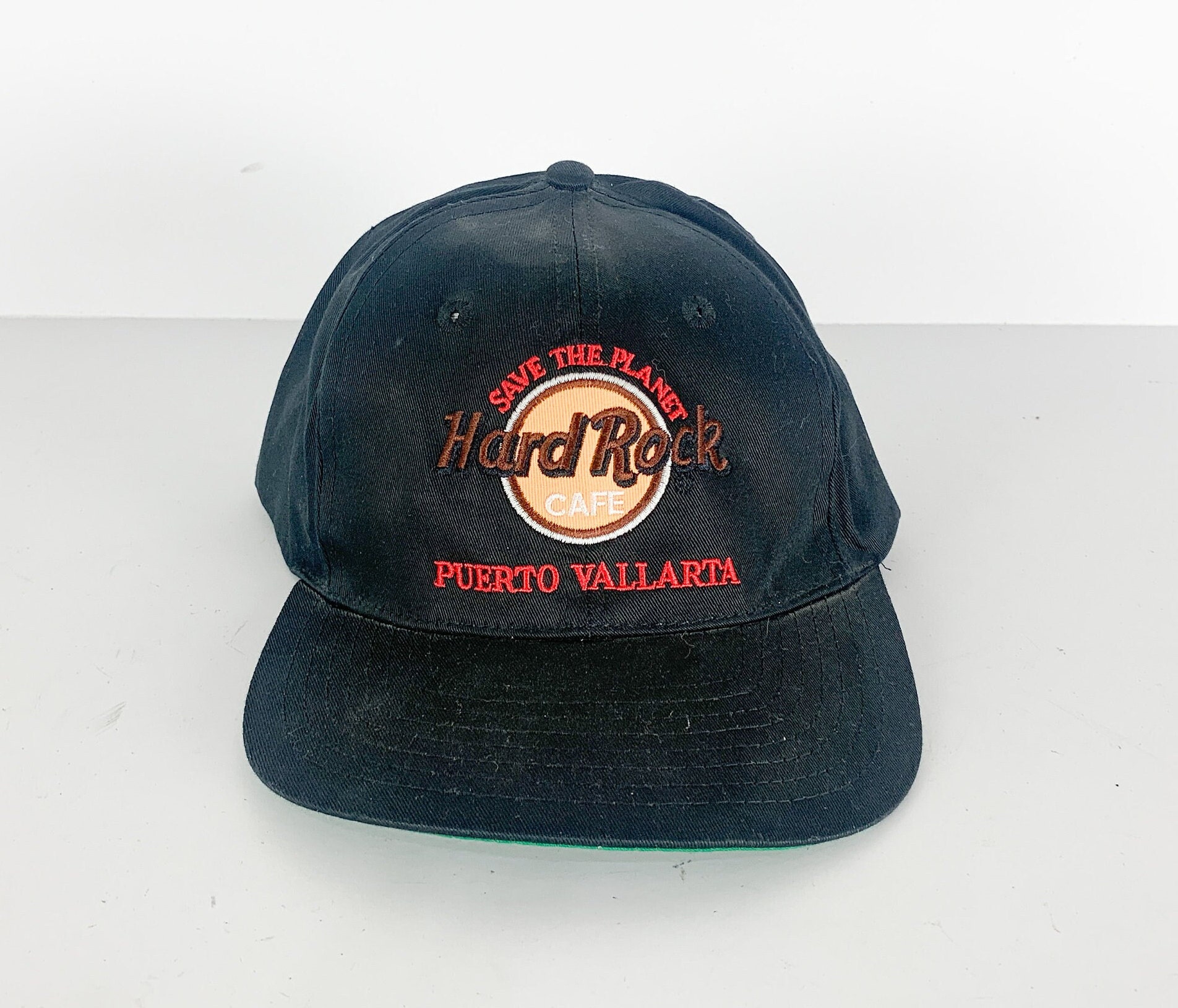 Vintage Save The Planet Hard Rock Cafe Porto Vallarta Schwarze Vintage 90Er Jahre Hut-Baseball-Cap Vintage Save The Planet Hard Rock Cafe Porto Vallarta Schwarze Vintage 90Er Jahre Hut-Baseball-Cap von everyoneinhats