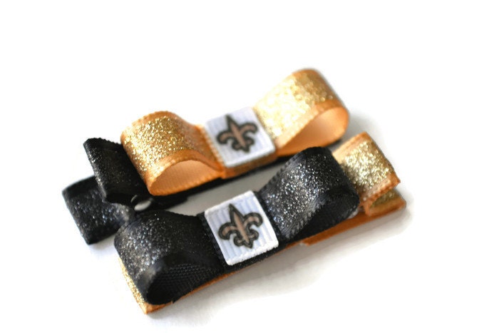New Orleans Saints Fußball Haarspangen, Baby Mädchen, Bögen, Heilige Baby, Football Haarspangen New Orleans Saints Fußball Haarspangen, Baby Mädchen, Bögen, Heilige Baby, Football Haarspangen von fairypatchboutique