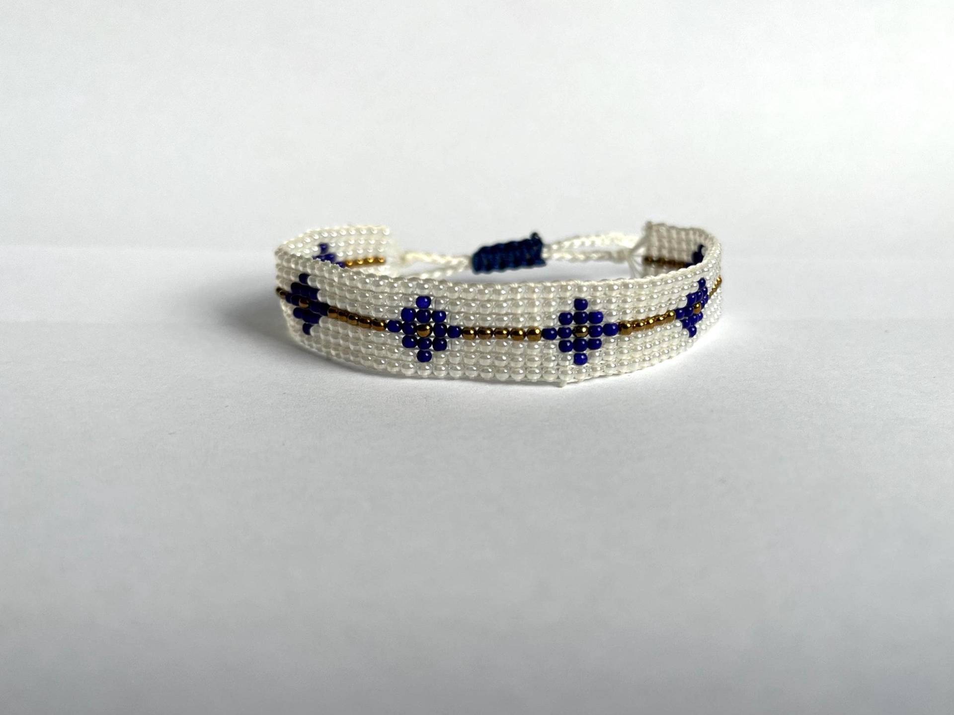 Handgefertigtes Perlenarmband Hakeln Bohemien Bunt Lila Weiß Blume Handgefertigtes Perlenarmband Hakeln Bohemien Bunt Lila Weiß Blume von handgefertigteperlen