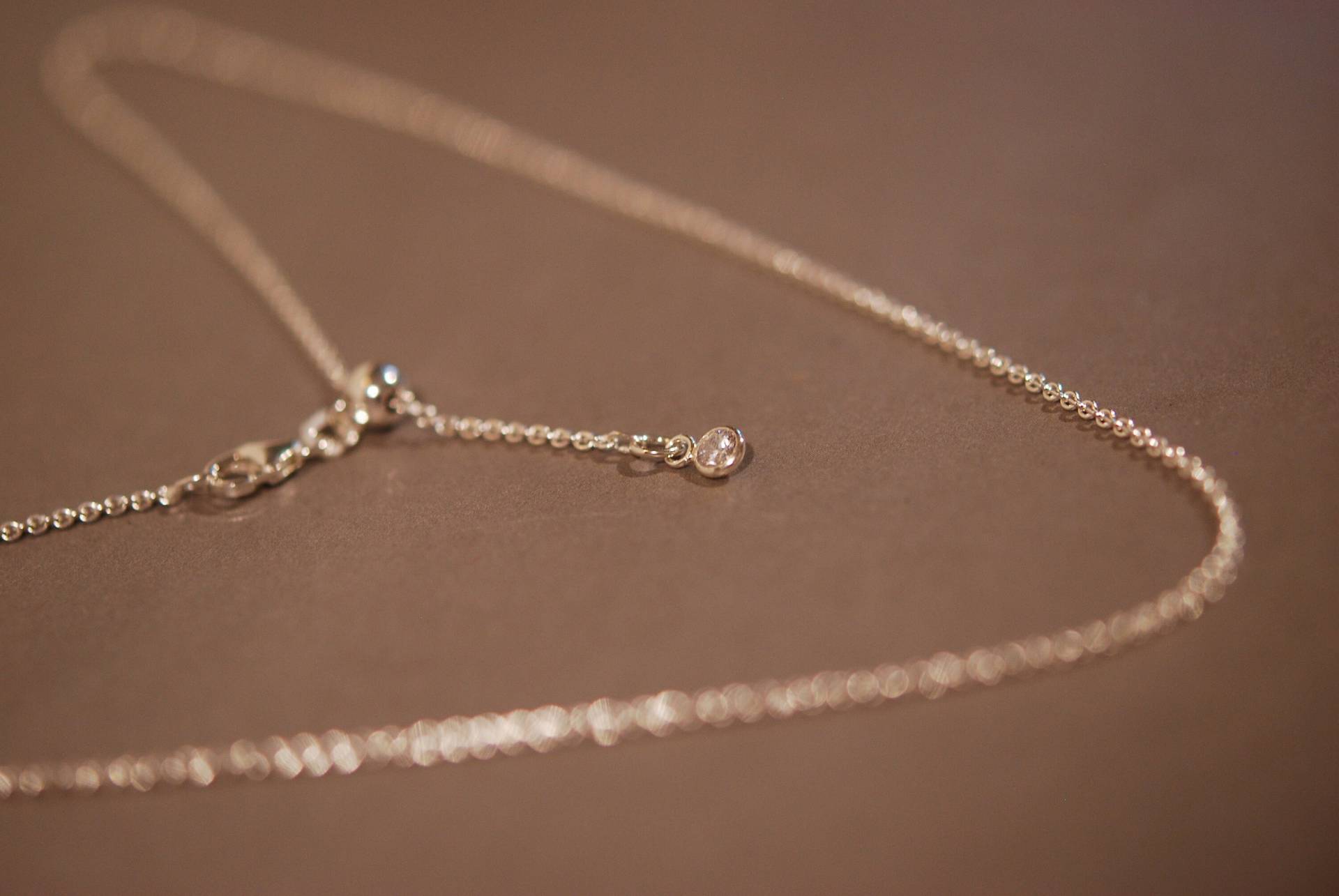 Längenverstellbare Silberkette, Ankerkette/ 1, 4mm/ 925 Sterling Silber, Feine Gliederkette, Länge Variabel. in 50cm Oder 70cm Erhältlich Längenverstellbare Silberkette, Ankerkette/ 1, 4mm/ 925 Sterling Silber, Feine Gliederkette, Länge Variabel. in 50cm Oder 70cm Erhältlich von iliosDesignerSchmuck