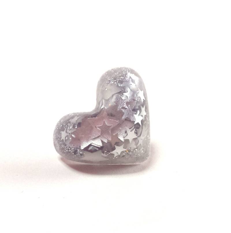 Glitzer Silber Harz-Herz-Ring Mit Silbernen Sternen Glitzer Silber Harz-Herz-Ring Mit Silbernen Sternen von jamesalicejewellery