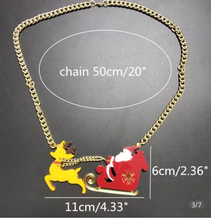 Acryl Santa Auf Schlitten Mit Rentierkette An Goldfarbener Kette von jaysdelights