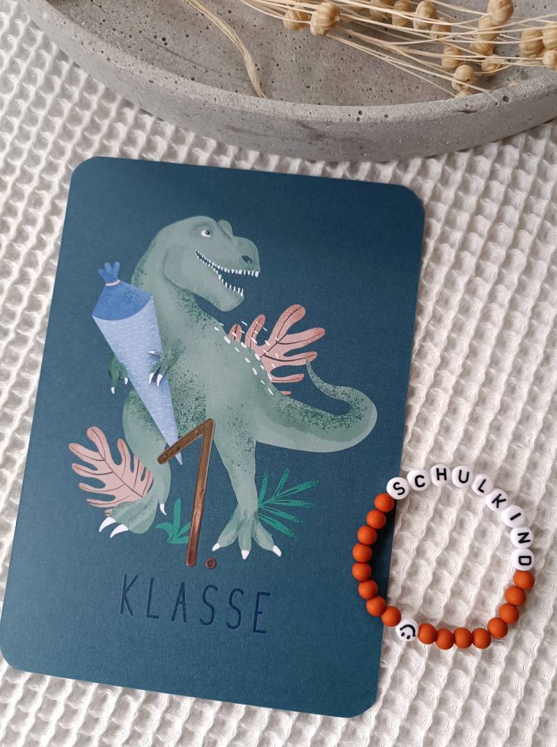 Armband Schulkind Mit Karte Einschulung Dino T-Rex Armband Schulkind Mit Karte Einschulung Dino T-Rex von julchensetsyshop