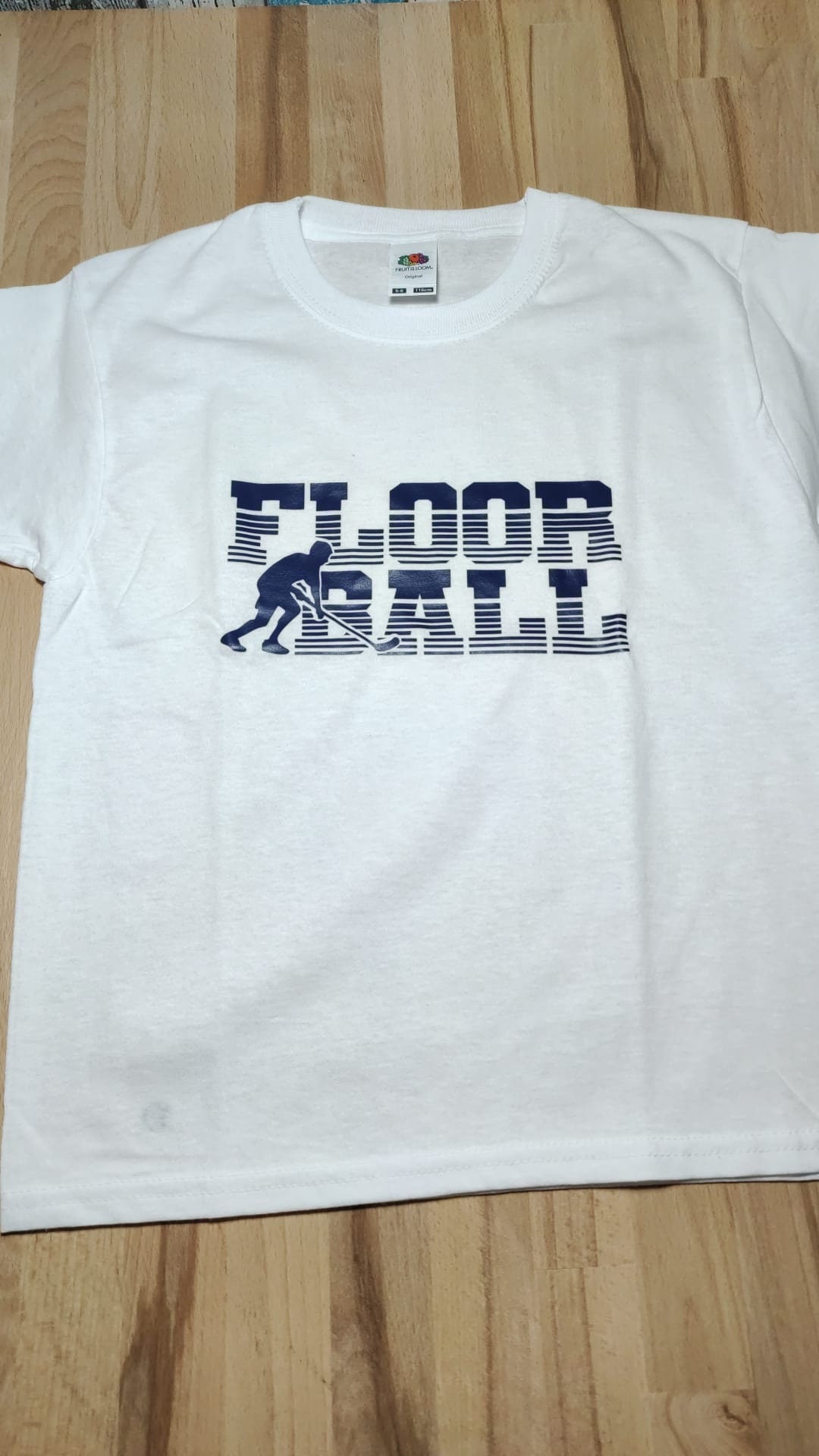 Shirt "Floorball Schriftzug Mit Spieler", Größe 116 von kleeneladys