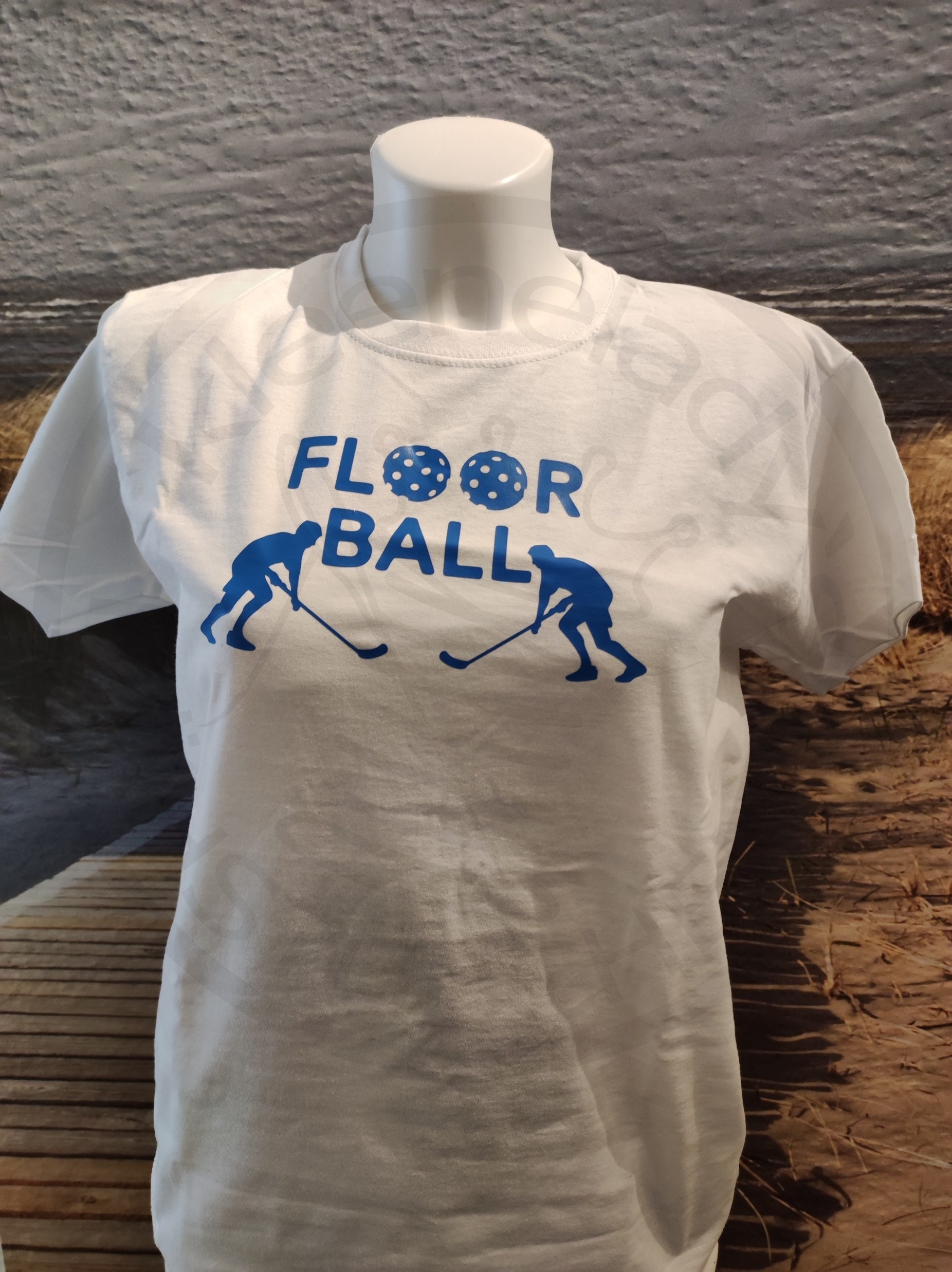 Shirt "Floorball Schriftzug Mit Zwei Spieler", Größe 140 von kleeneladys