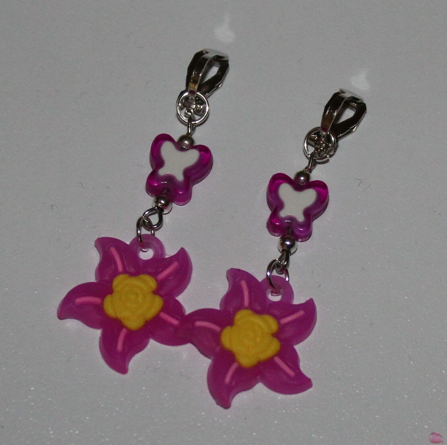 Kinderohrclips Blume Schmetterling Fuchsia Kinderohrclips Blume Schmetterling Fuchsia von kleinerprinzshop
