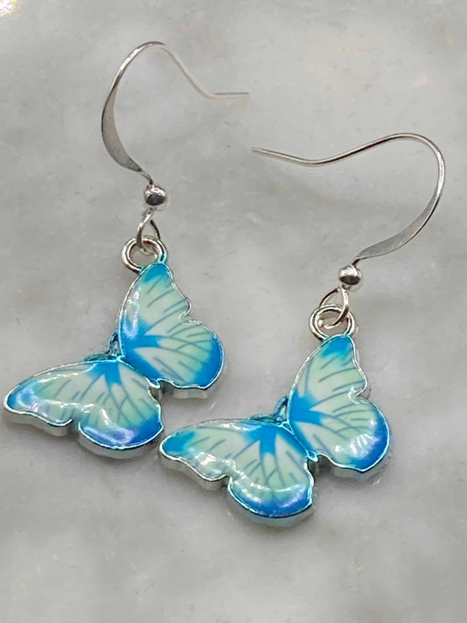 Silberfarbene Morpho Schmetterling Ohrringe Silberfarbene Morpho Schmetterling Ohrringe von lalaVintageJewellery