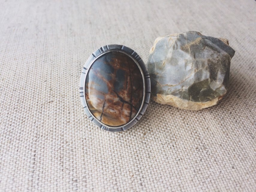 Nguni Jaspis Leuchtender Ring Nguni Jaspis Leuchtender Ring von liontoothhandmade